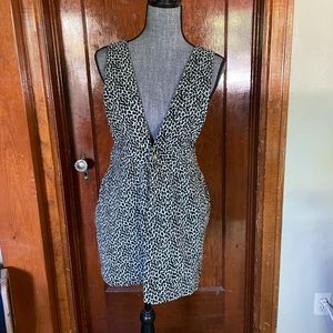 Short suspender dress.